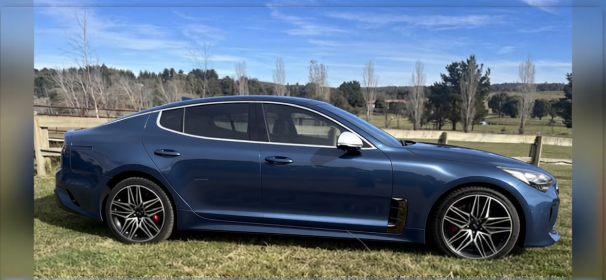 Your car rendered in Frozen Satin Metallic Charcoal Blue gloss wrap