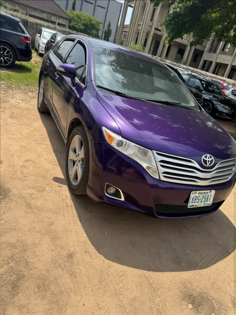 Toyota Camry rendered in Midnight Purple gloss paint