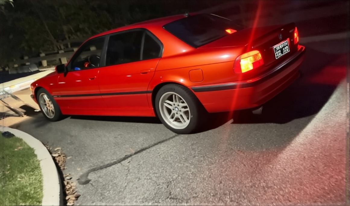 BMW 8 Series rendered in Gloss Dragon Fire Red gloss wrap
