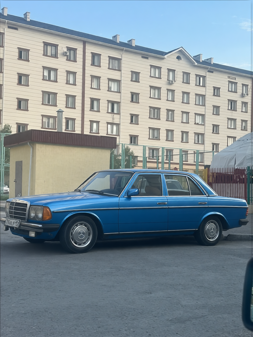 Mercedes-Benz E-Class rendered in Gulf Blue gloss paint