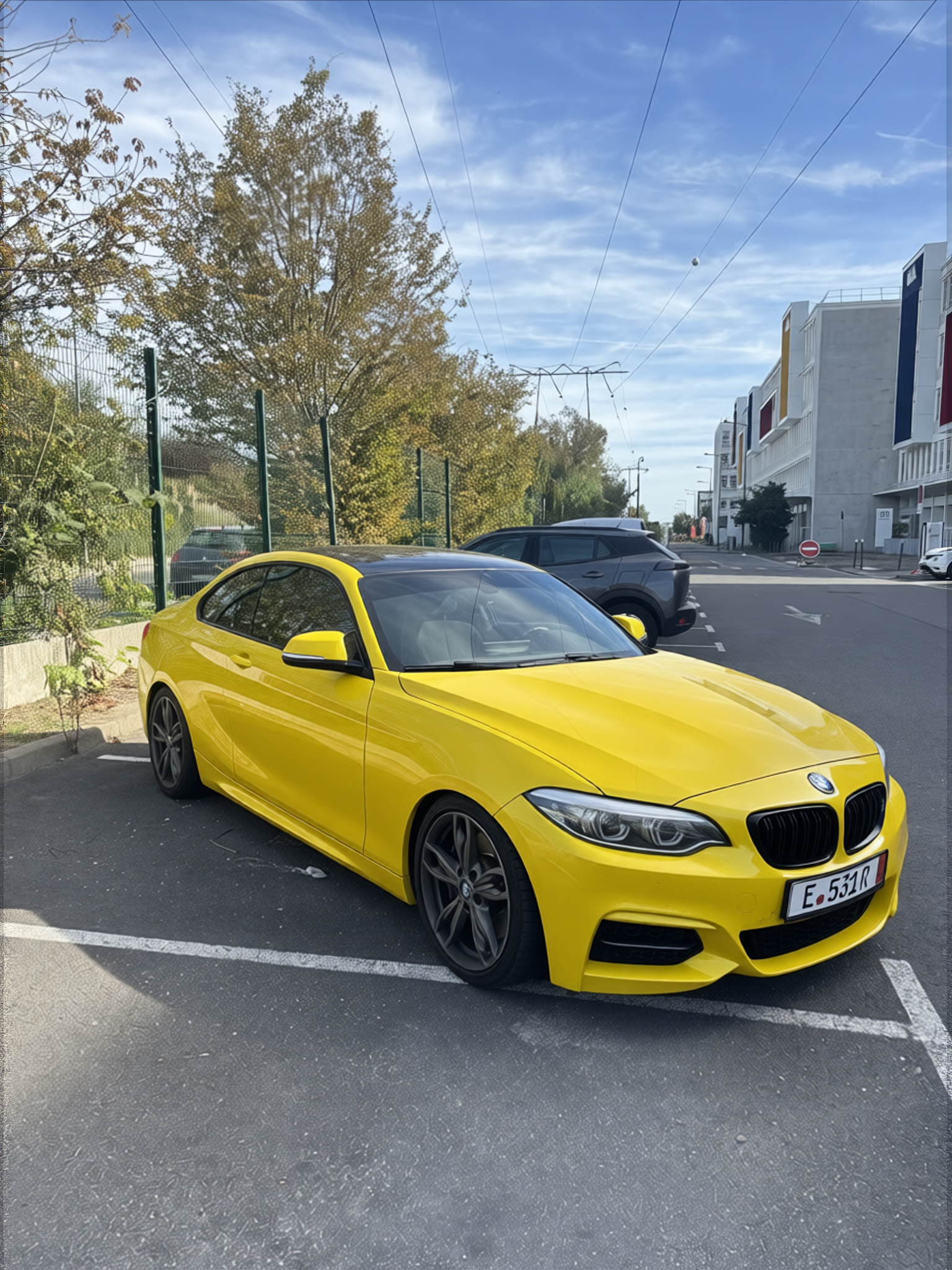 BMW M240i rendered in Racing Yellow gloss paint
