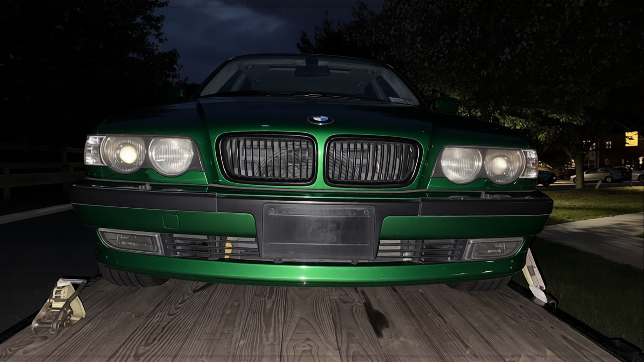 BMW 3 Series rendered in Racing Green gloss paint