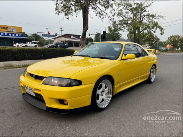 Nissan GT-R rendered in Racing Yellow gloss paint