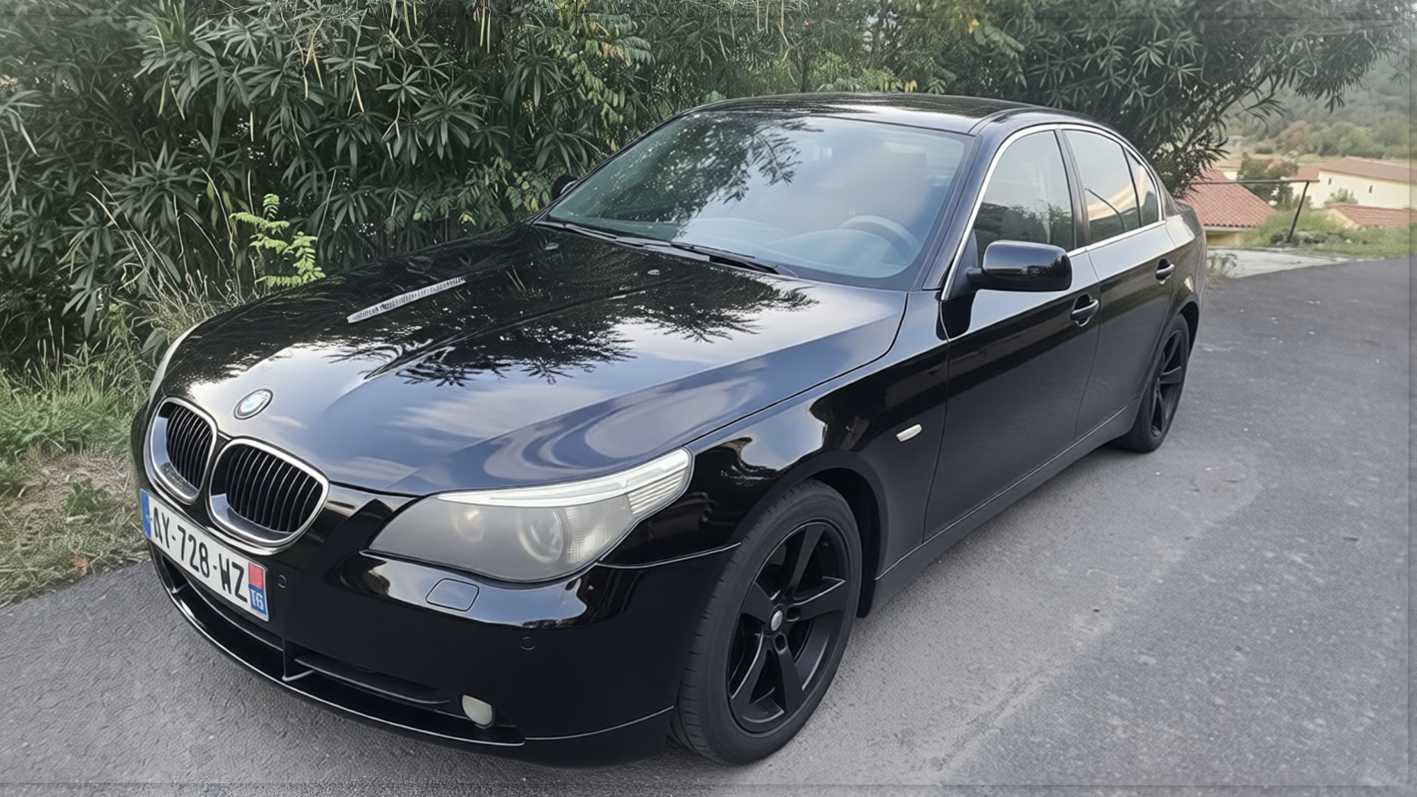 BMW 5 Series rendered in Black gloss paint