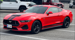Ford Mustang rendered in Ferrari Red gloss paint