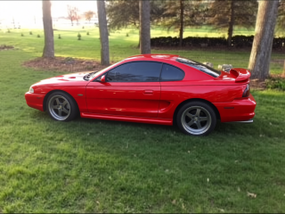 Pontiac Trans Am rendered in Ferrari Red gloss paint