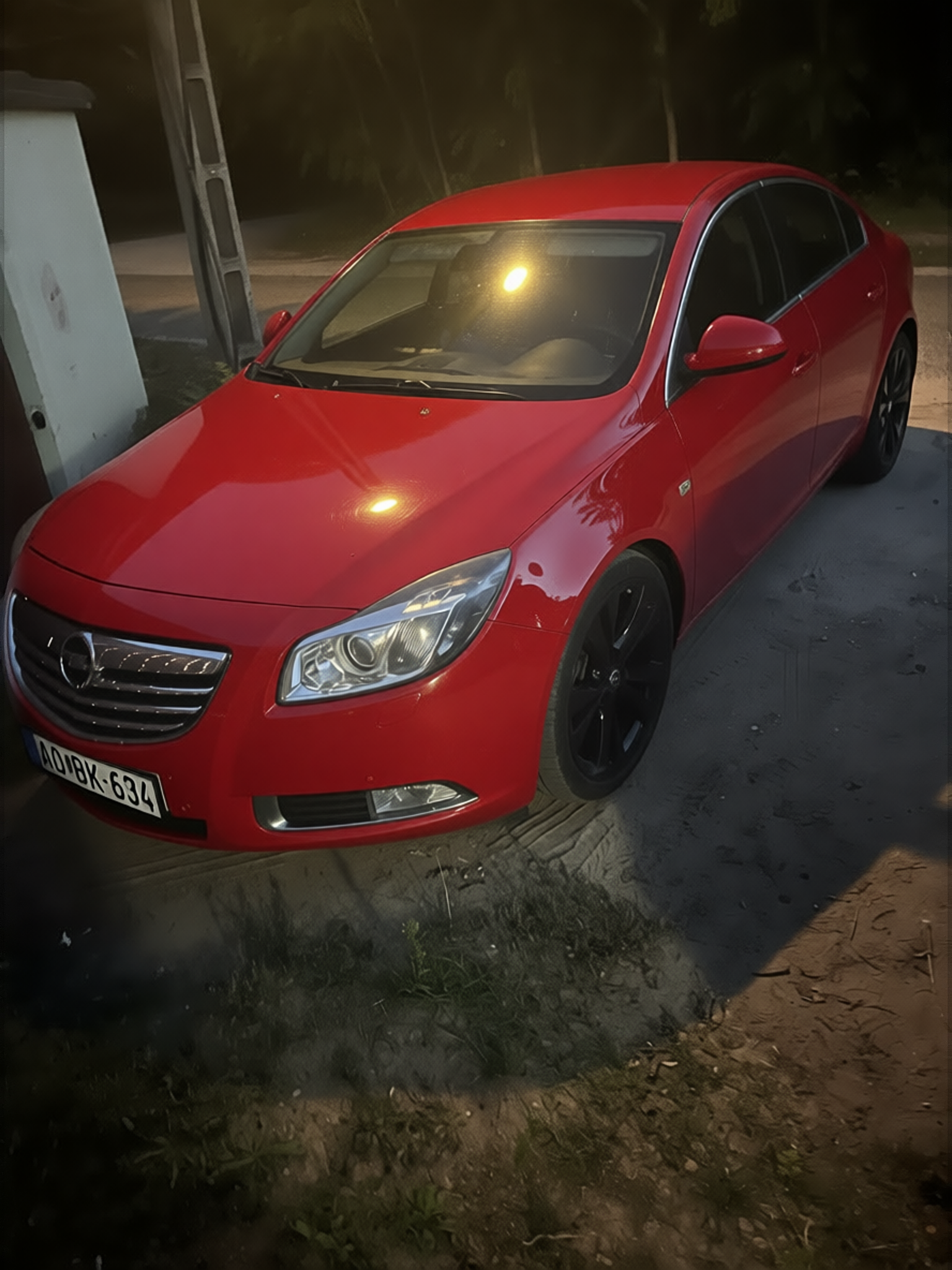 Opel Insignia rendered in Ferrari Red gloss paint