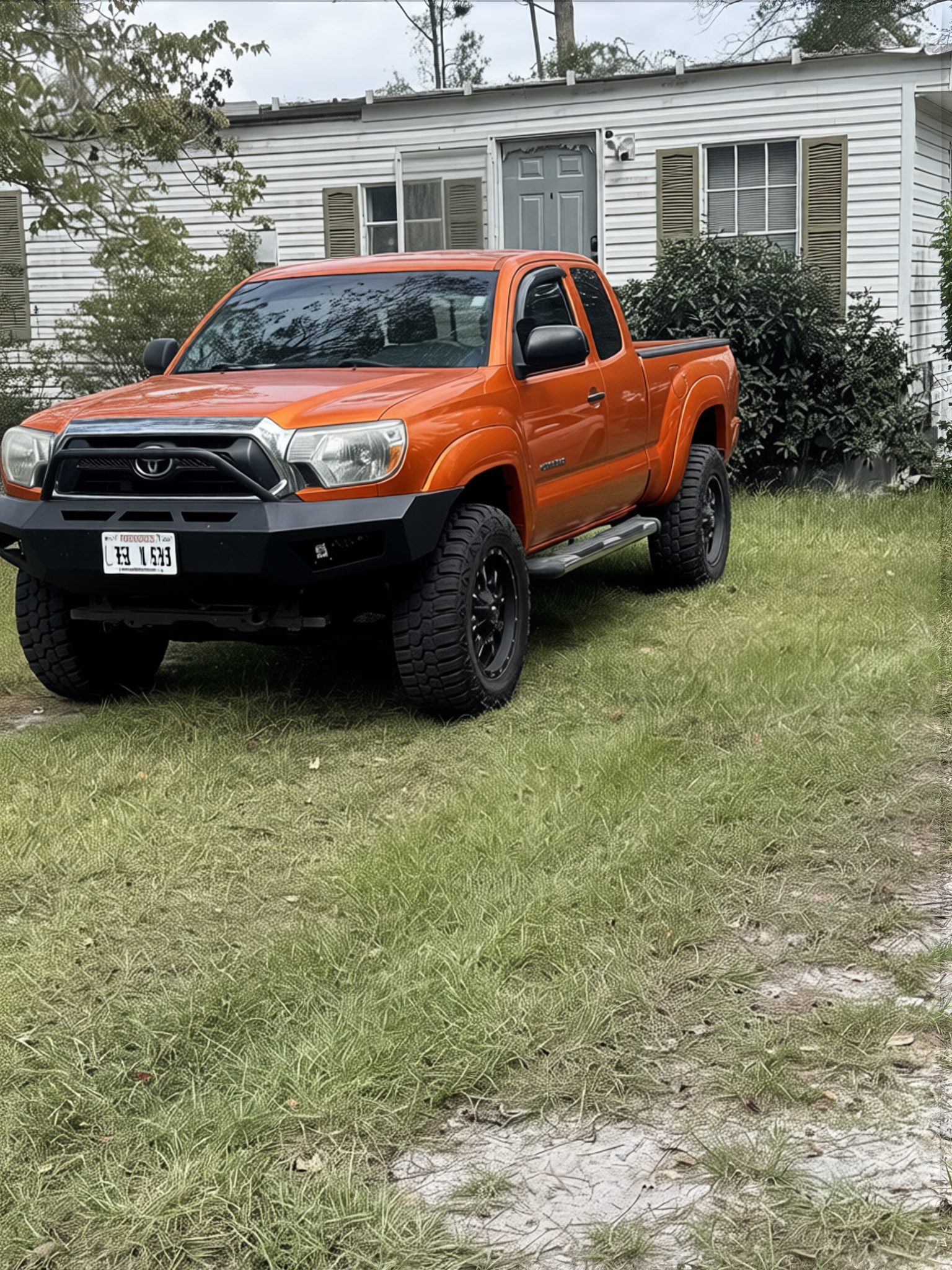 Toyota Tacoma en Lava Orange gloss paint