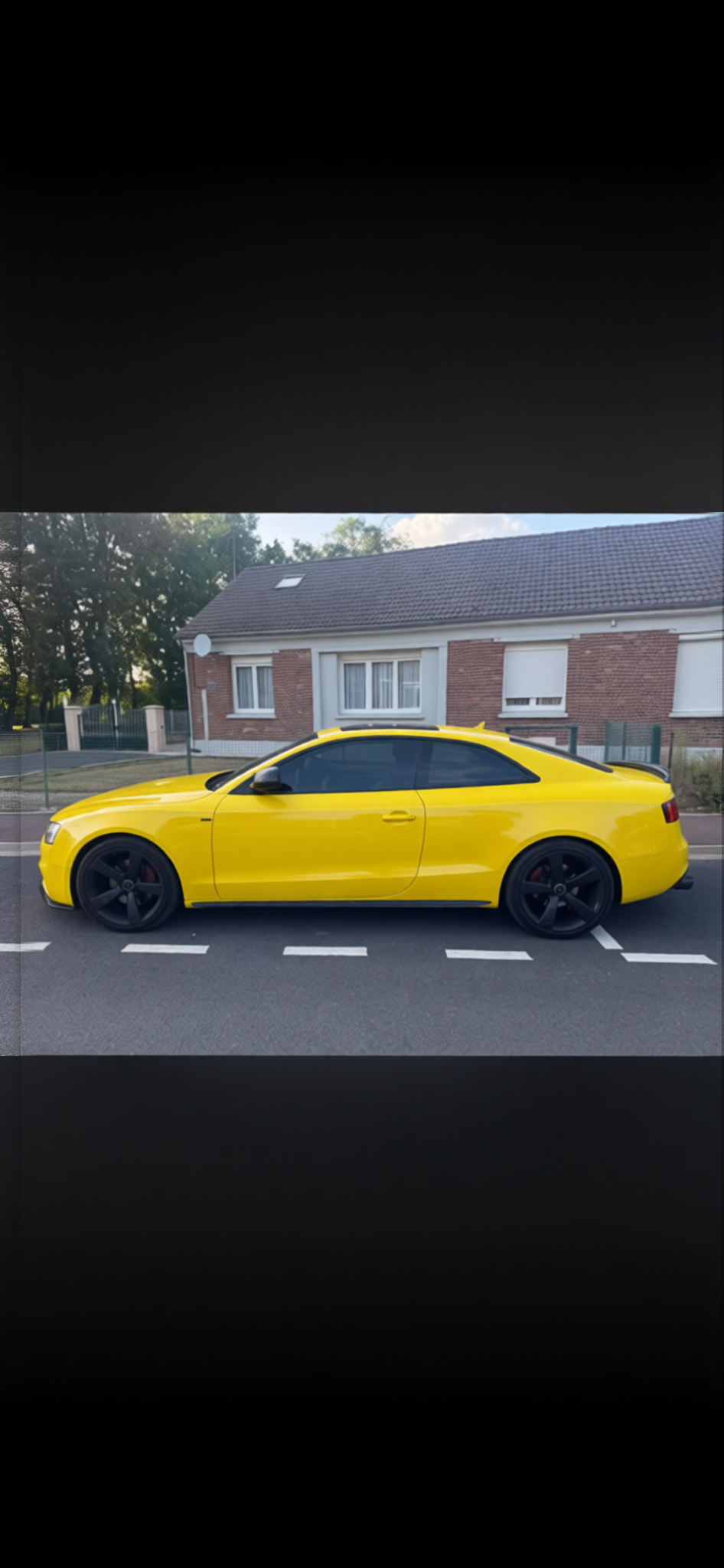 Audi A5 rendered in Racing Yellow gloss paint