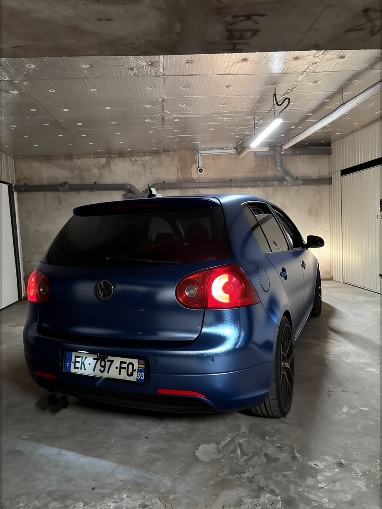 Volkswagen Golf rendered in Frozen Satin Metallic Charcoal Blue gloss wrap