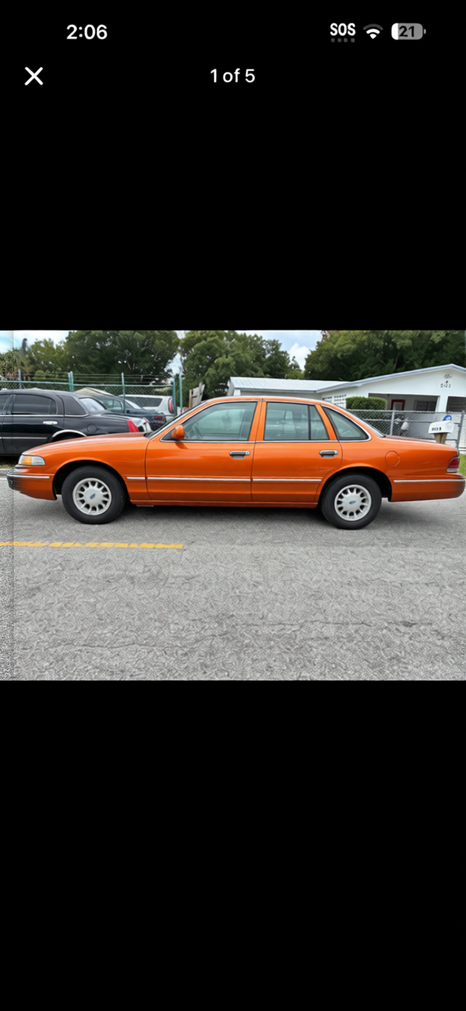Lincoln Town Car rendered in Lava Orange satin paint
