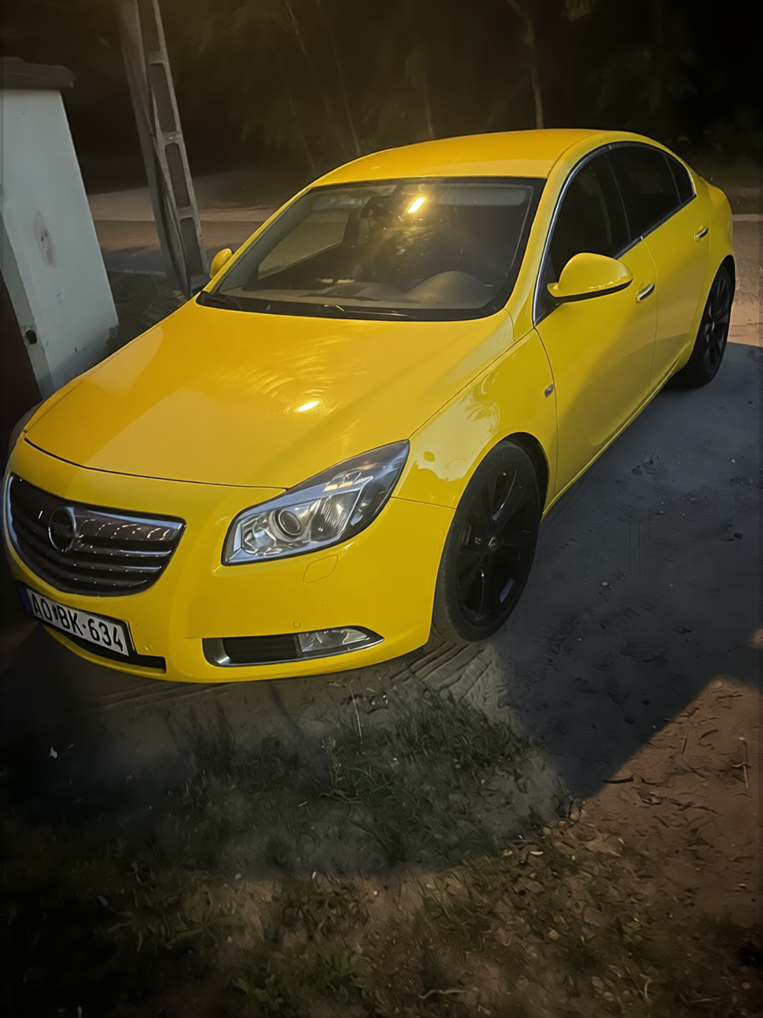 Opel Insignia rendered in Racing Yellow gloss paint