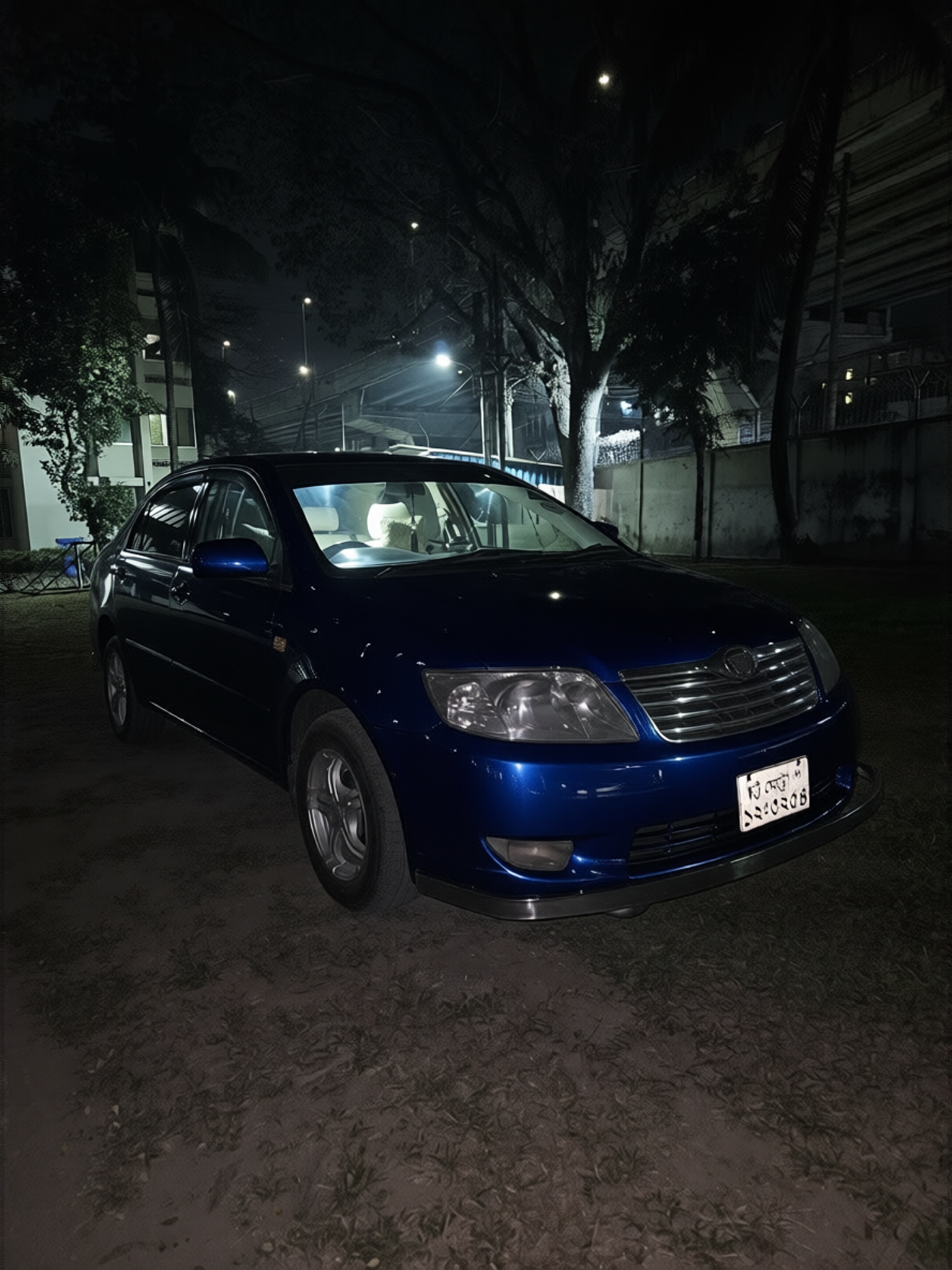 Toyota Corolla rendered in Deep Navy gloss paint