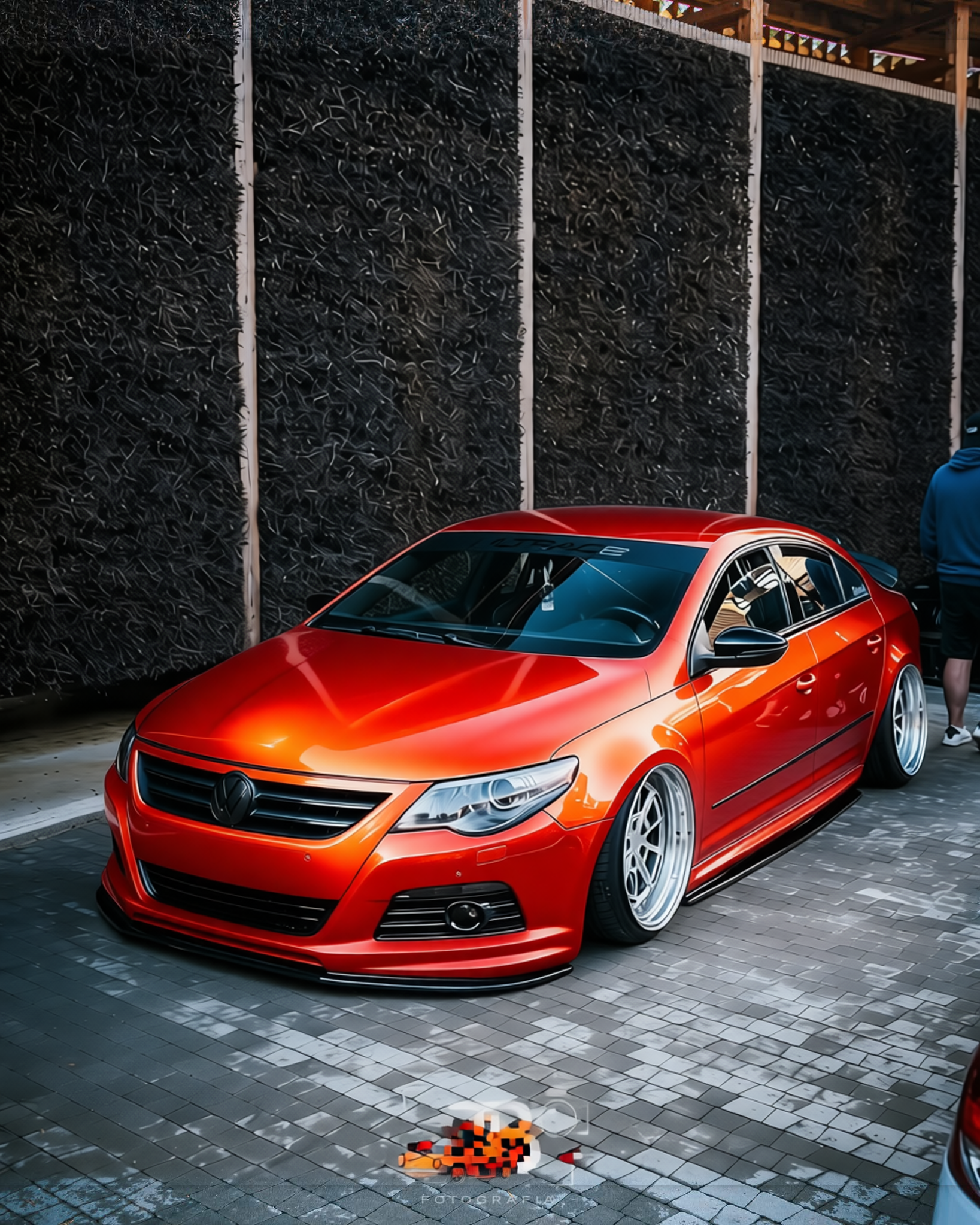 Volkswagen CC rendered in Gloss Dragon Fire Red gloss wrap