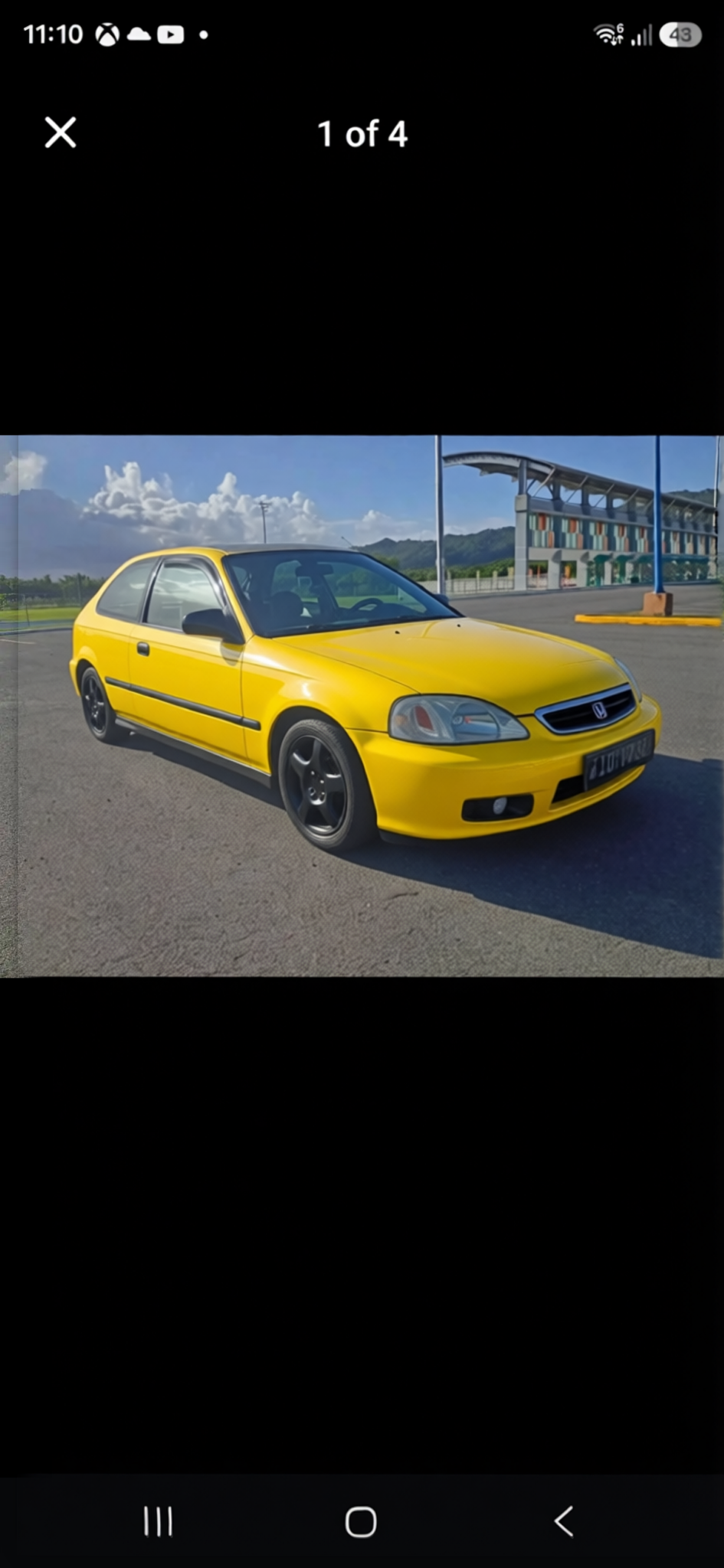 Honda Civic rendered in Racing Yellow gloss paint