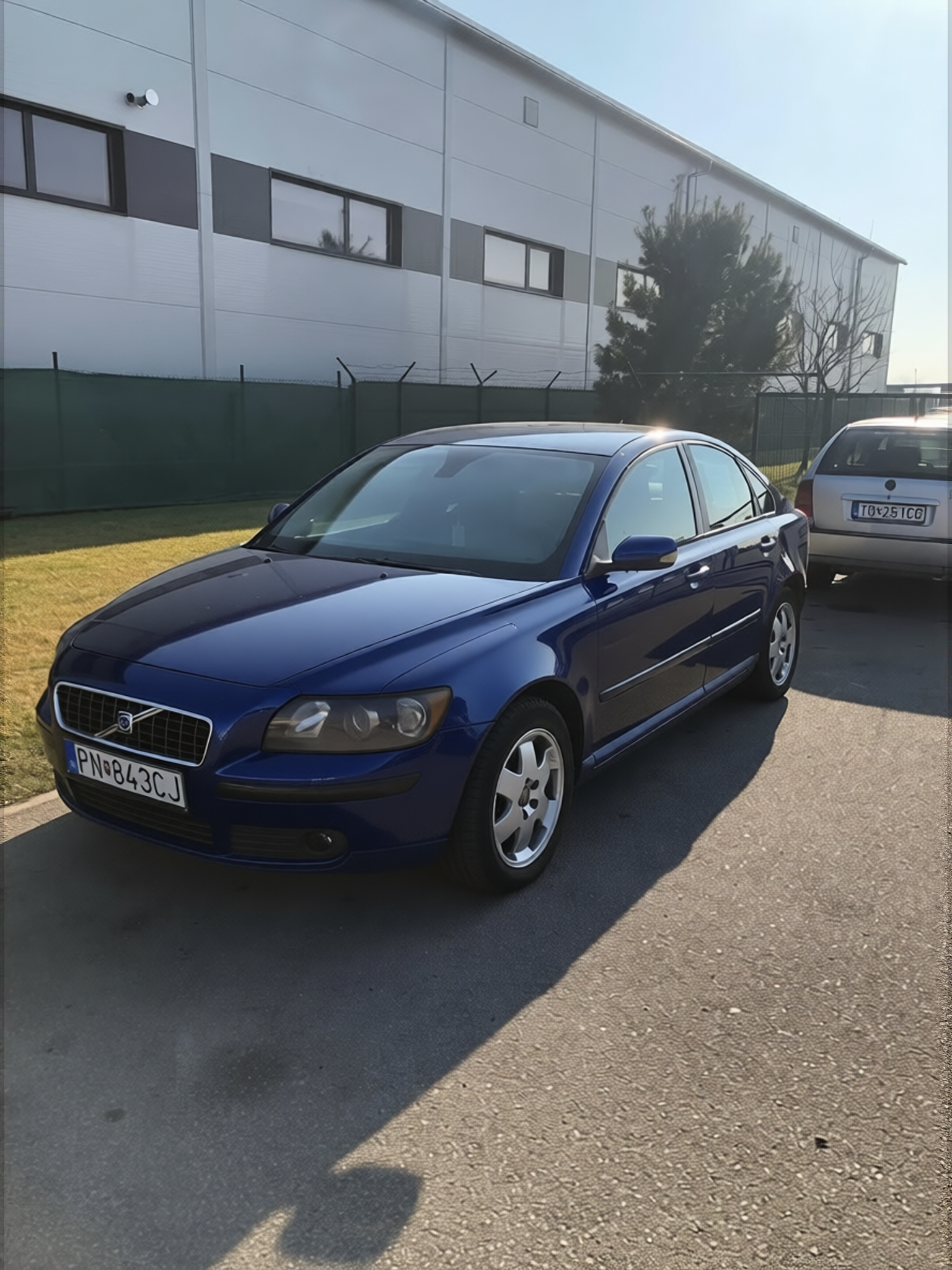 Volvo S60 rendered in Deep Navy gloss paint