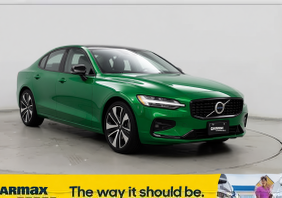 Volvo S60 rendered in Racing Green gloss paint